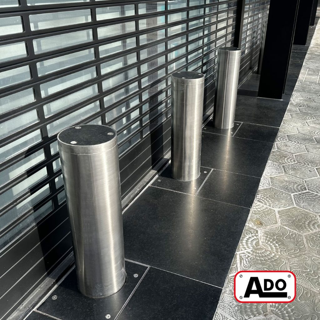 Retractable stainless steel bollards