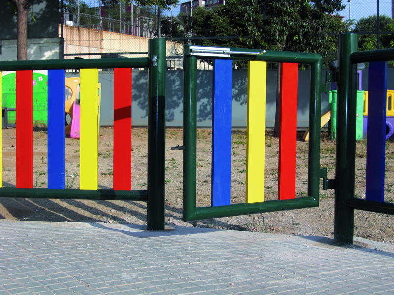 Set of metal playground fences and bicycle parkings