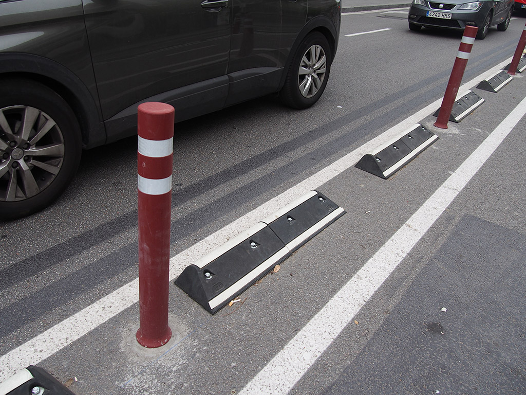 Asymmetric Mompe road separators installed