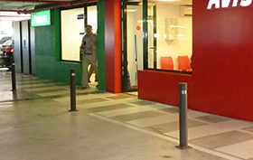 city bollards with airport parking plate