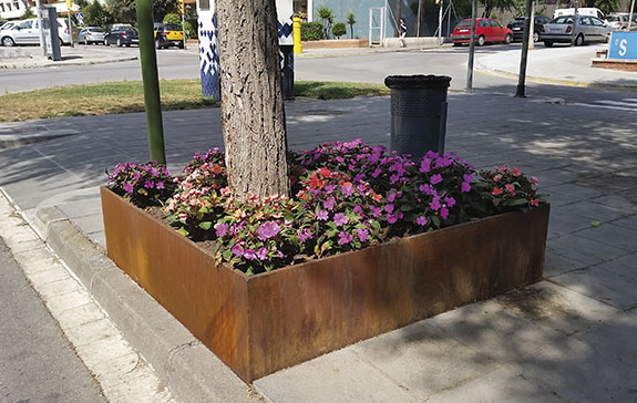 corten steel tree planter installed