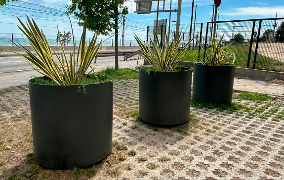 curvi planters in corten oxiron installed