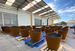 circular planter in corten sheet installed